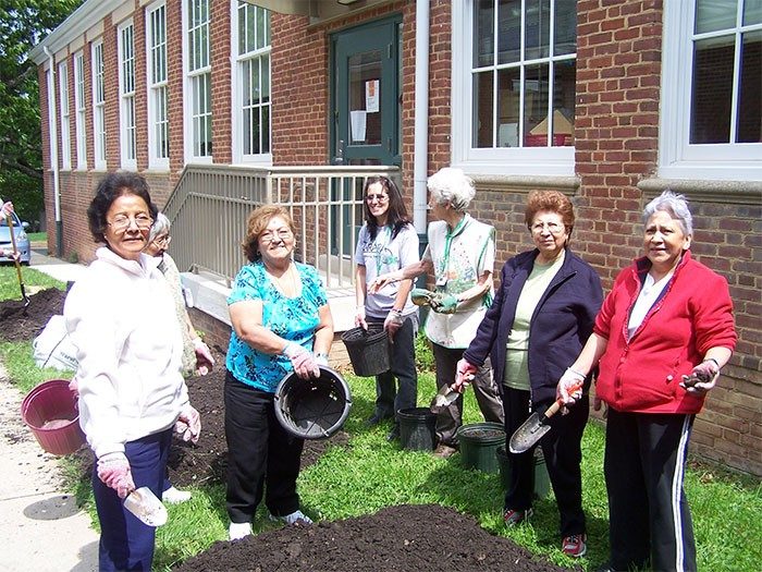 Diverse communities connect through community gardens in Arlington