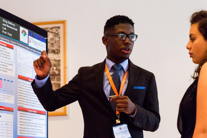Student presenting at a professional conference