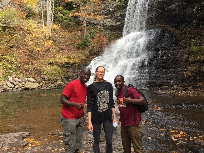 Dickson Otieno (L) and Paul Kahenya (R) of Egerton-CESAAM enjoy the Cascades with Gill Eastwood of Entomology