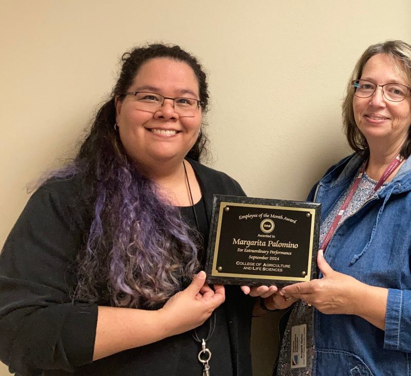 CALS employee of the month, Margarita Palomino, receiving plaque