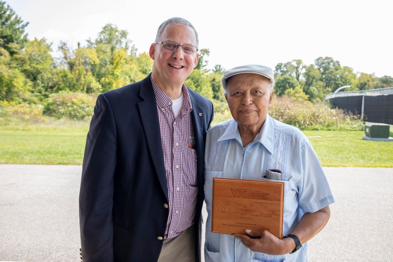 Dean Alan Grant with Dr. Randy Grayson, who received a recognition of appreciation for his service to the George Washington Carver Program