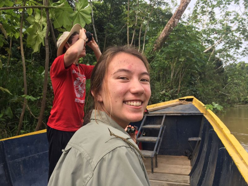 The students, along with a hitchhiking praying mantis, enjoy an afternoon on the Amazon River.